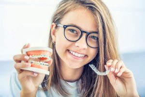 girl with invisalign