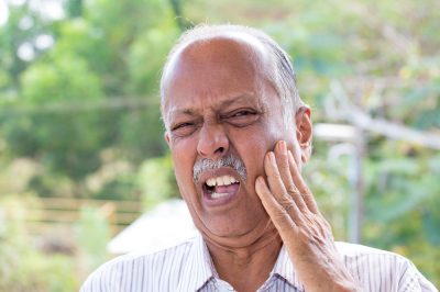 man with tooth pain