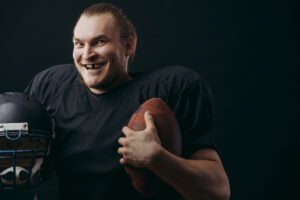 athlete with missing tooth