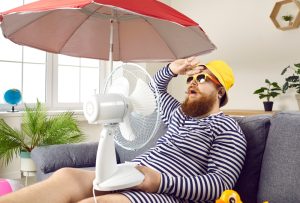 man suffering in hot florida weather