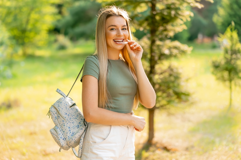 young woman to teen with invisalign