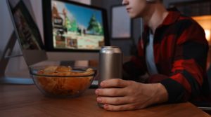 young adult with energy drink